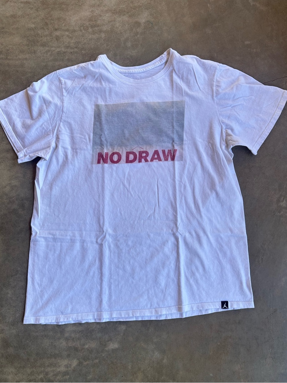 Jordan White Short-Sleeve Tee with Pink "NO DRAW" Graphic